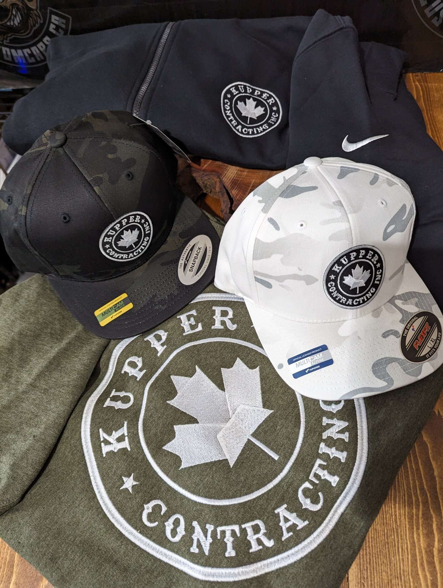 Embroidered caps and jumbo chest logo sewn out